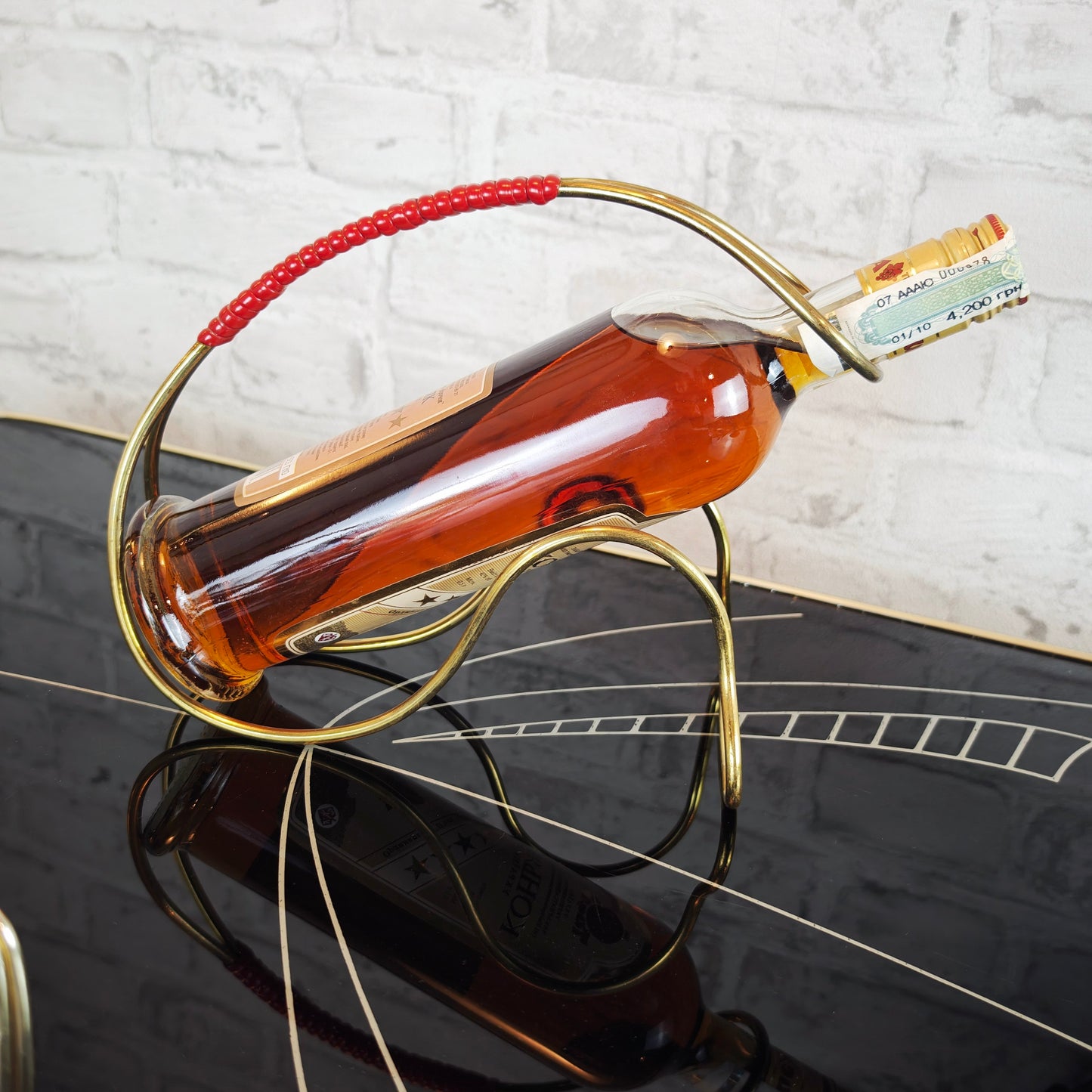 Midcentury Flaschenhalter Messing goldfarben String Ära Weinhalter 50er Jahre Retro