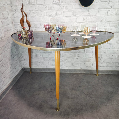 Midcentury Nierentisch schwarz Marmoroptik 50er Jahre Dreibein Messingrand Holzbeine Space Age Rockabilly