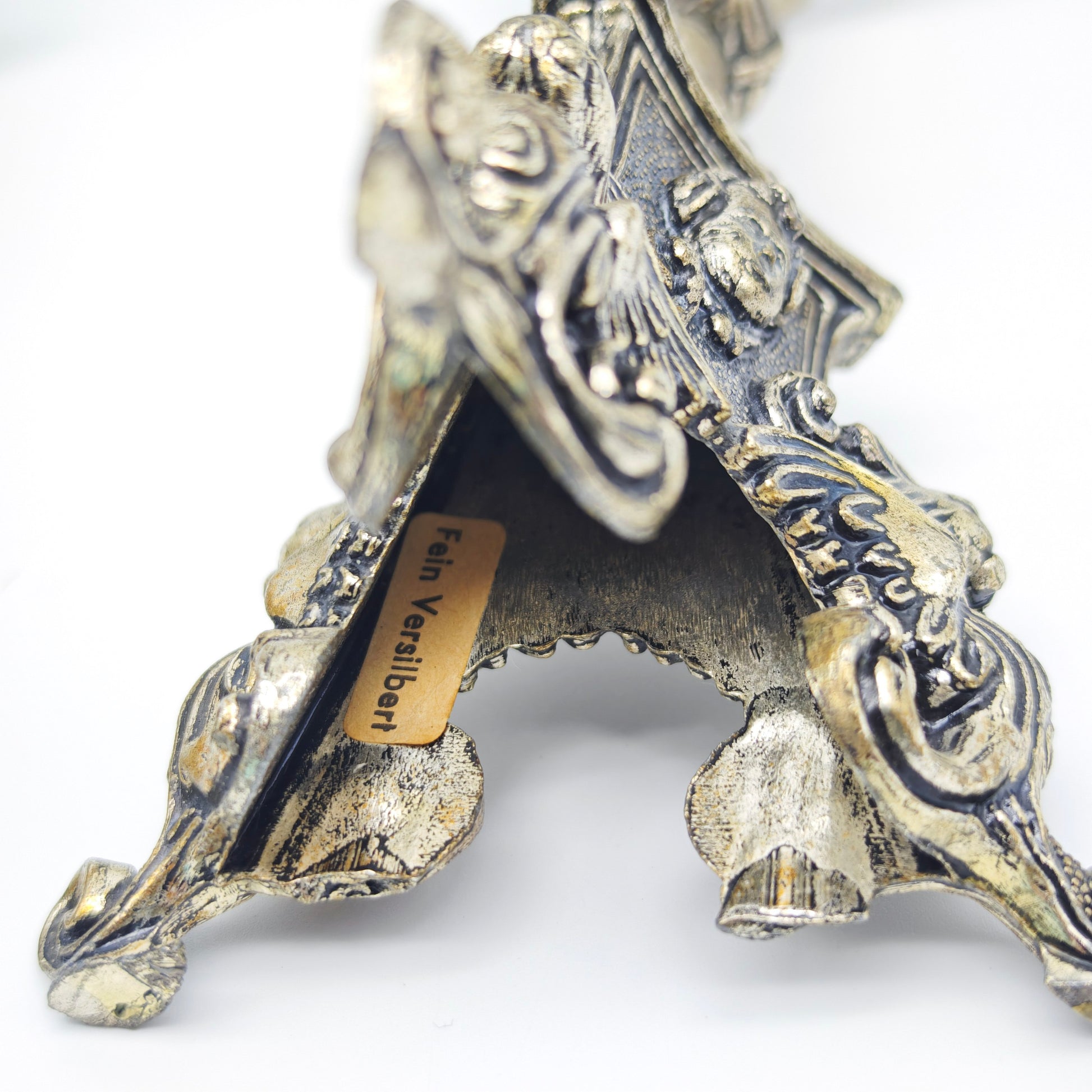 Neobarocke Kerzenhalter aus versilbertem Metall mit Puttenköpfen und Drachenfüßen als Set