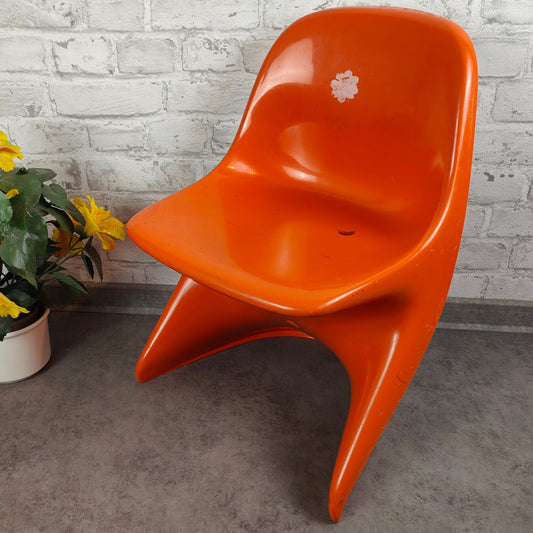 Casalino Stuhl Kinder Design Alexander Begge für Casala 70er Jahre orange Kunststoff space age vintage atomic midcentury sputnik stapelbar