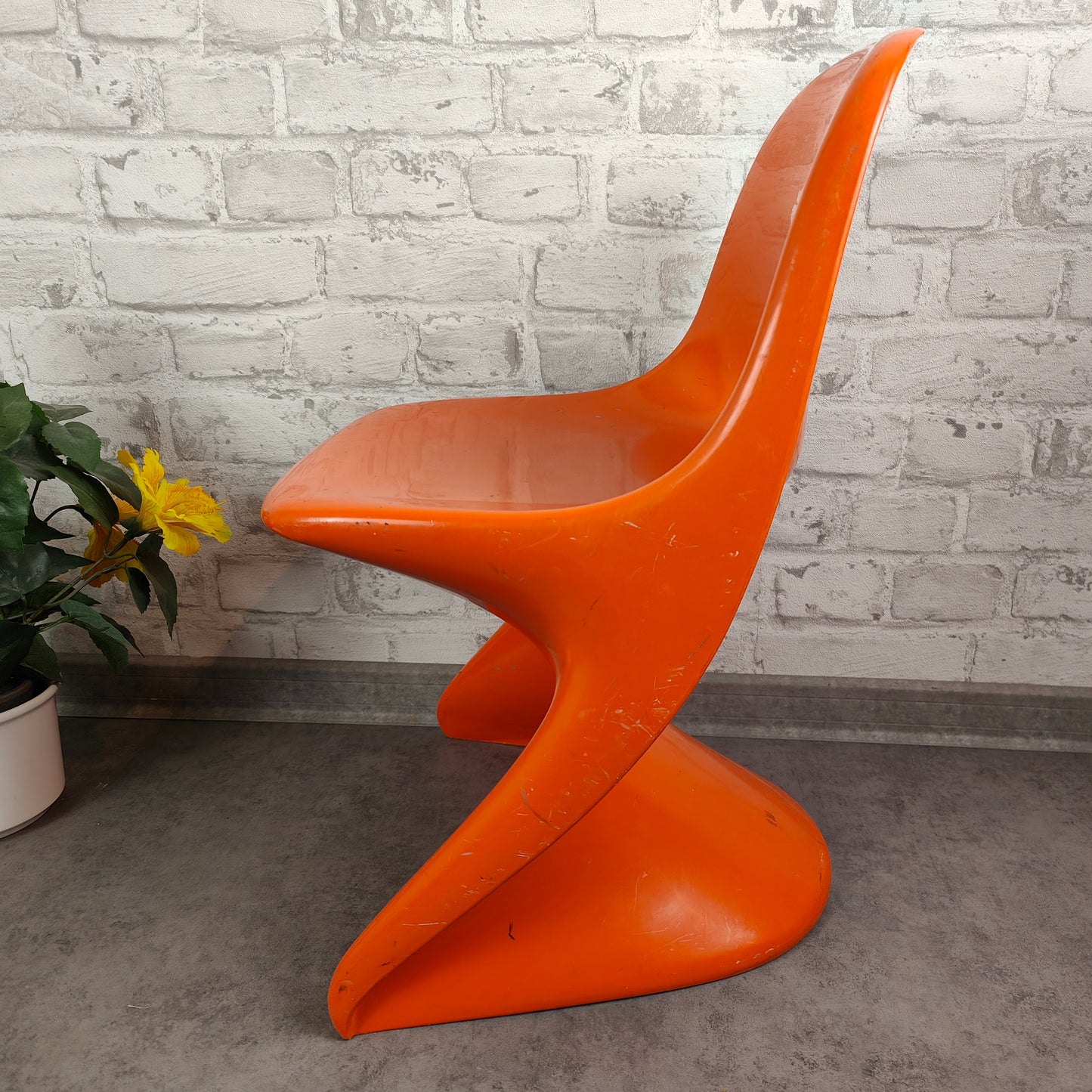 Casalino Stuhl Kinder Design Alexander Begge für Casala 70er Jahre orange Kunststoff space age vintage atomic midcentury sputnik stapelbar