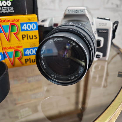 Minolta Dynax 505si Super mit Sigma 28–70mm & 70–210mm APO + 4 Filme Analogkamera Set SLR